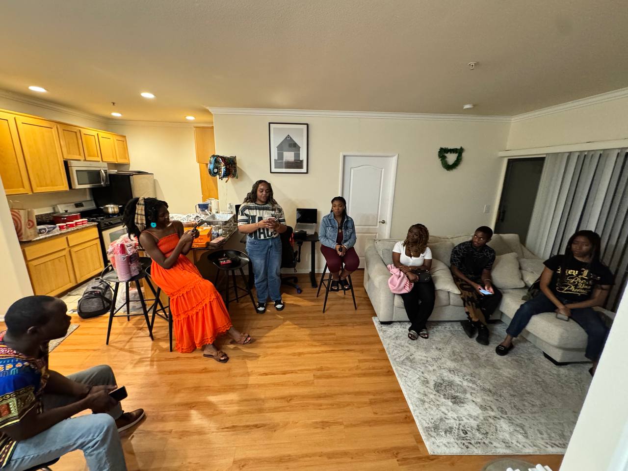 CAMYOUA members gathered indoors for a community event